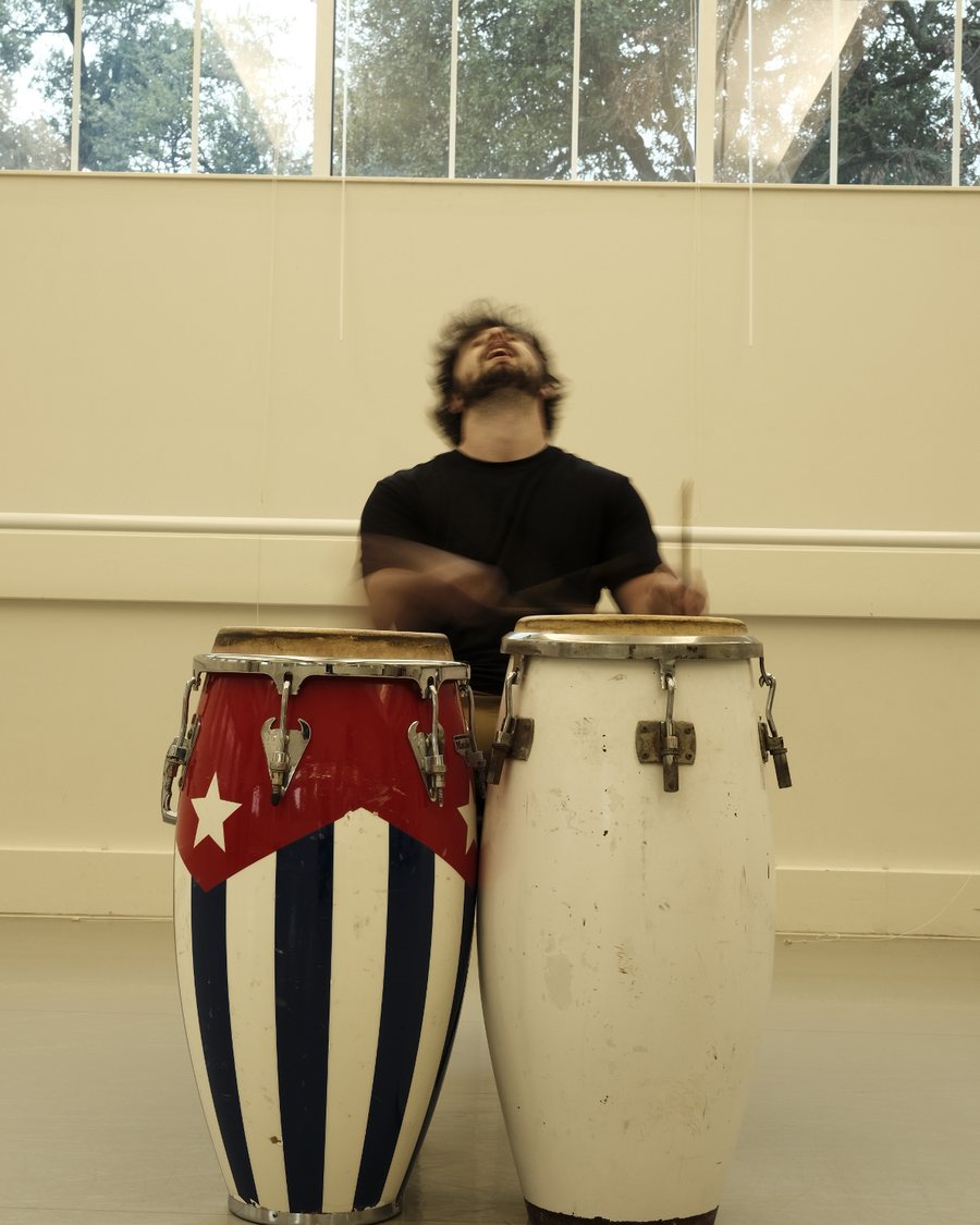 William Labossiere playing congas