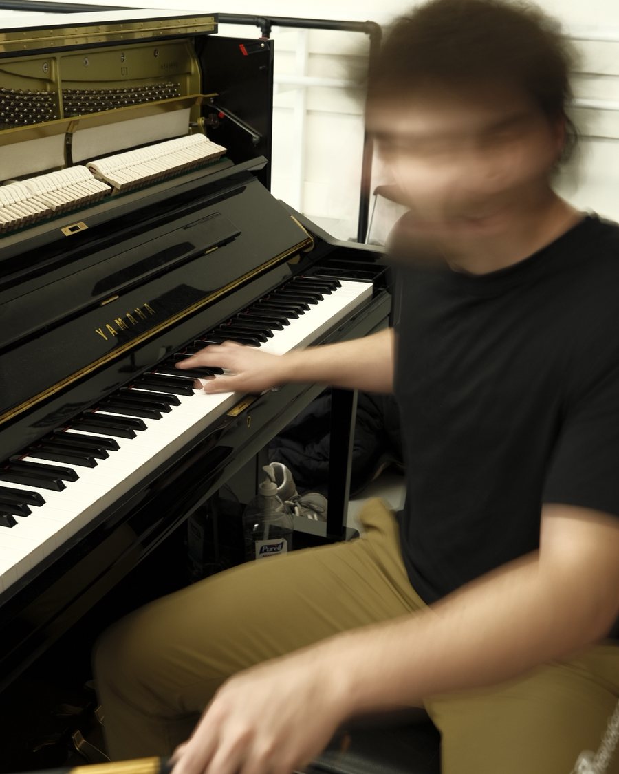 William Labossiere at the piano